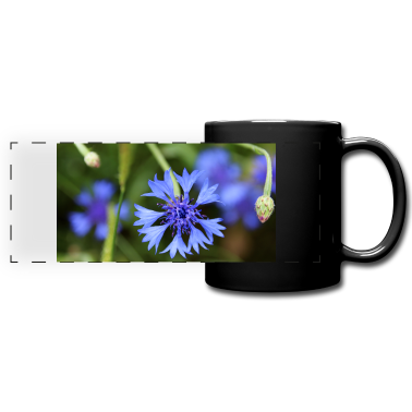 Einzug Tasse - Eine blaue Kornblume auf einer grünen Wiese.